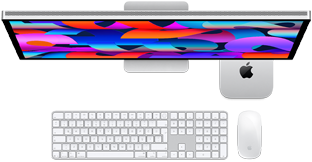 Studio Display’in altına yerleştirilmiş Mac mini, Sayısal Tuş Takımlı Magic Keyboard, Magic Mouse