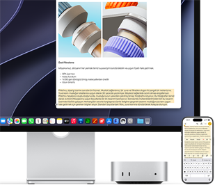 Mac mini’nin önden görünümü, Studio Display’in altına yerleştirilmiş, aygıtın ve ekranın sağ tarafında bir iPhone duruyor, iPhone’da seçili metnin üzerinde kes, kopyala, yapıştır ve AutoFill komutları görülüyor ve seçili metnin aynısı ekranda da gösteriliyor, Evrensel Pano özelliği vurgulanıyor